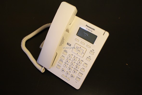 Телефон Panasonic KX-UT123RU-B на столе